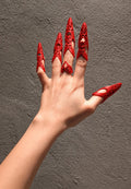 3D printed claw finger rings worn on a hand, Halloween costume accessory
