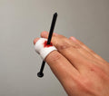 Fake nail through finger prank bandage, 3D printed Halloween joke